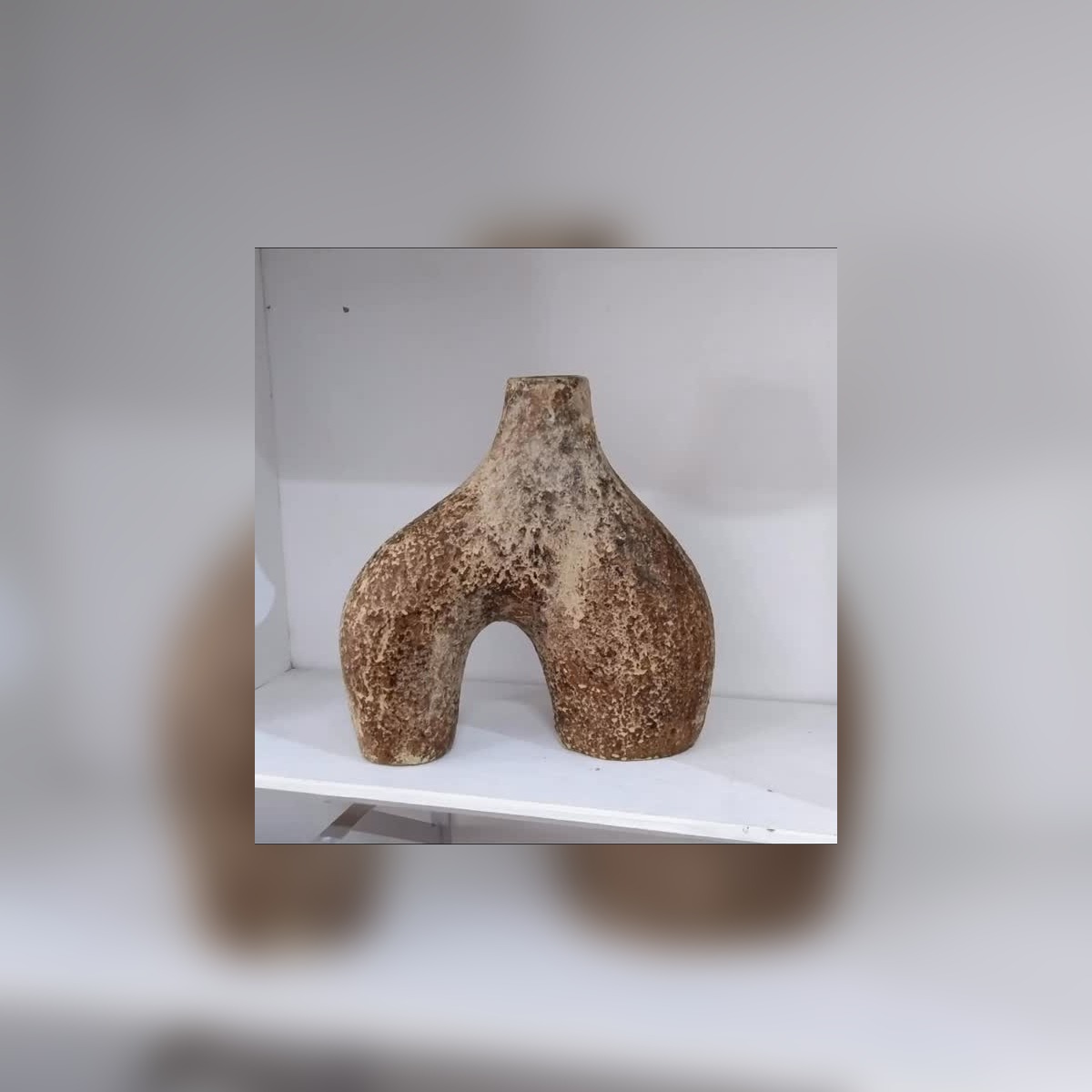 Rustic sculptural terracotta vessel